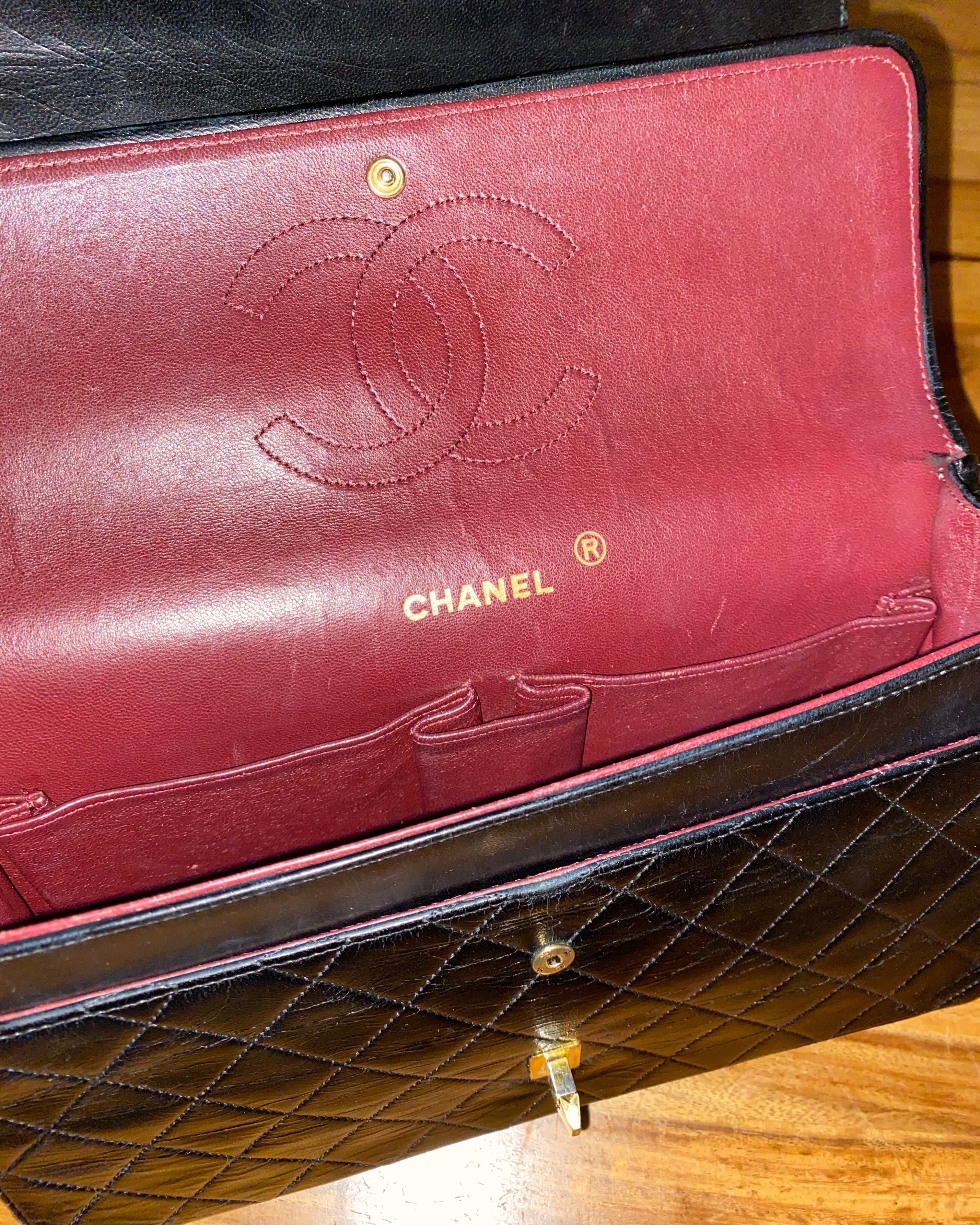 CHANEL • Timeless 27 double flap bag with a reissue chain • Black