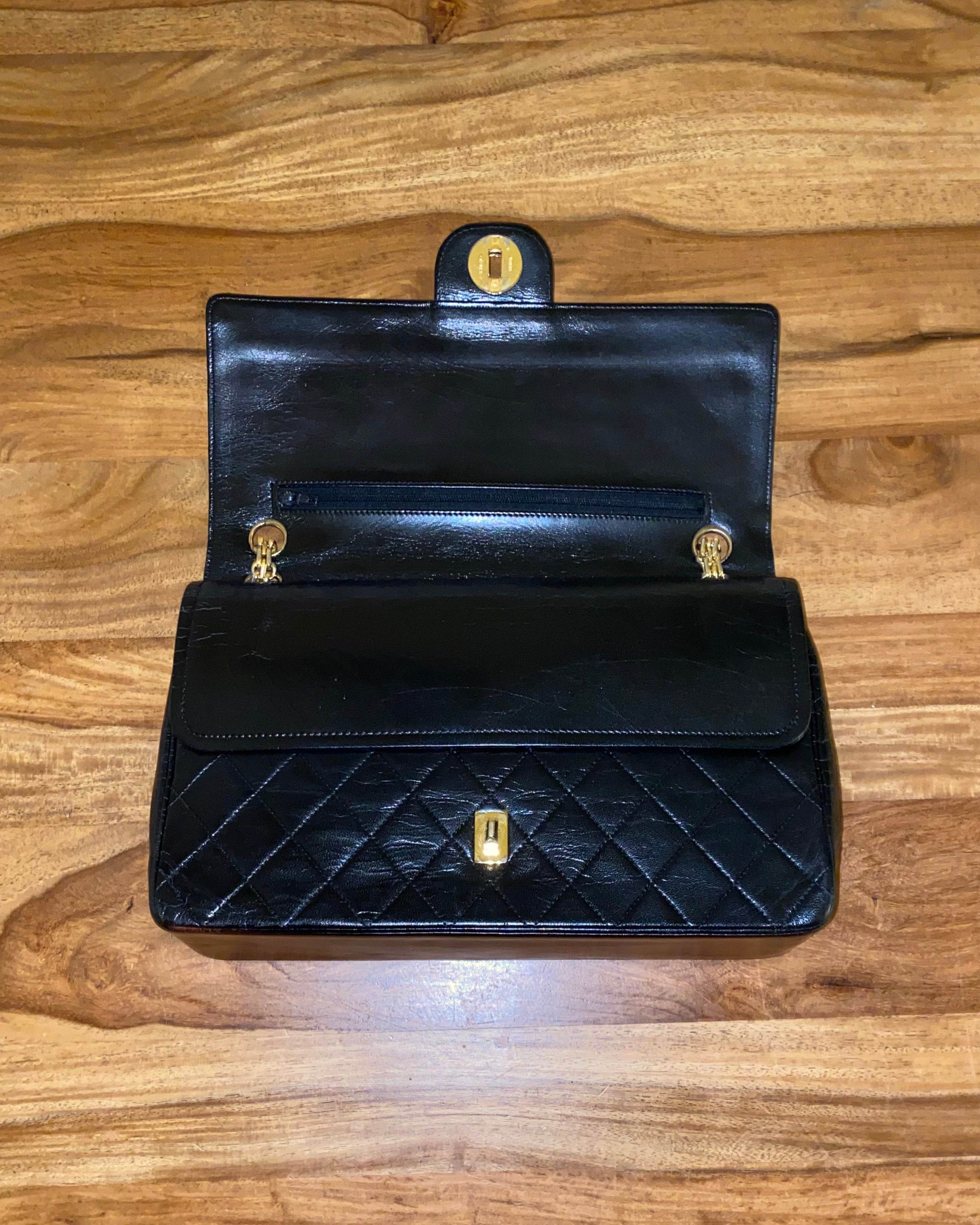 CHANEL • Timeless 27 double flap bag with a reissue chain • Black