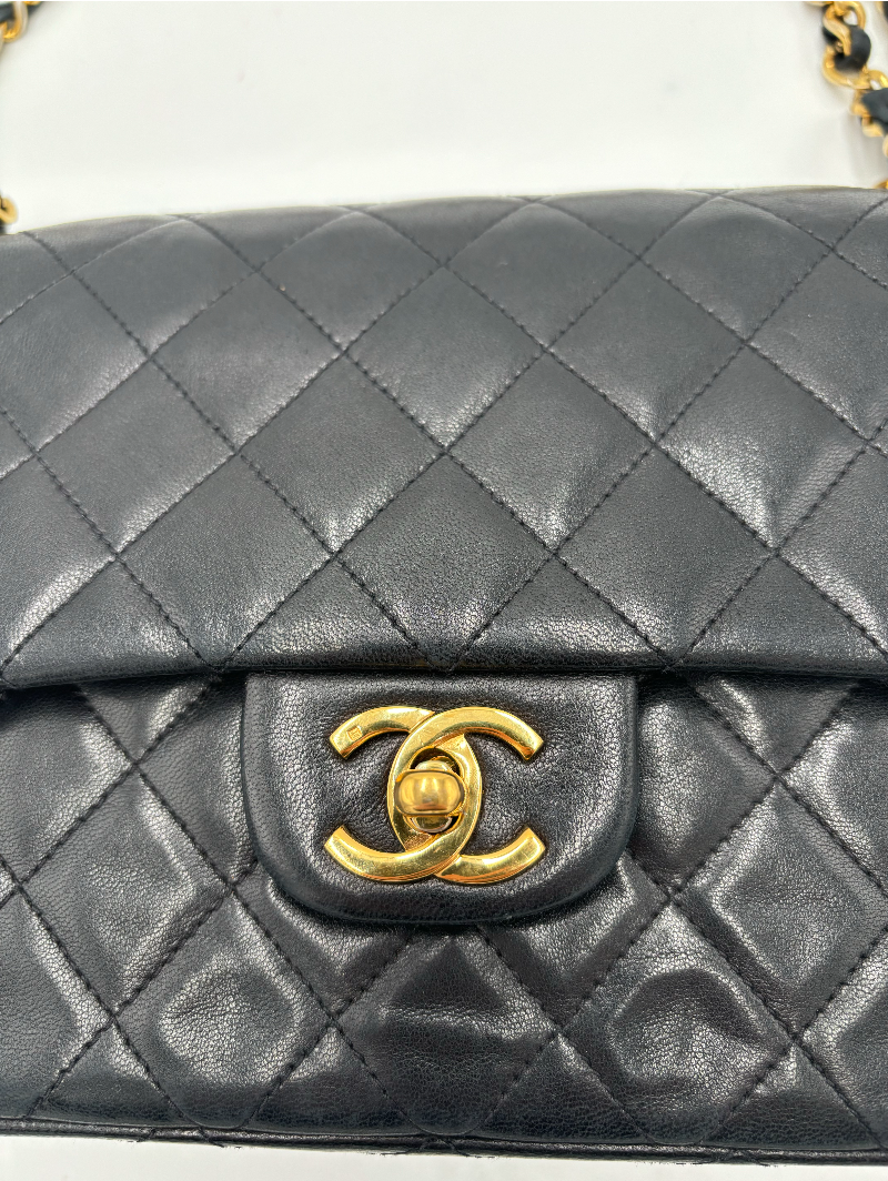 CHANEL • Timeless 25 double flap bag • Black